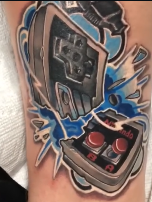 Retro Nintendo controllers with blue lightning tattoo